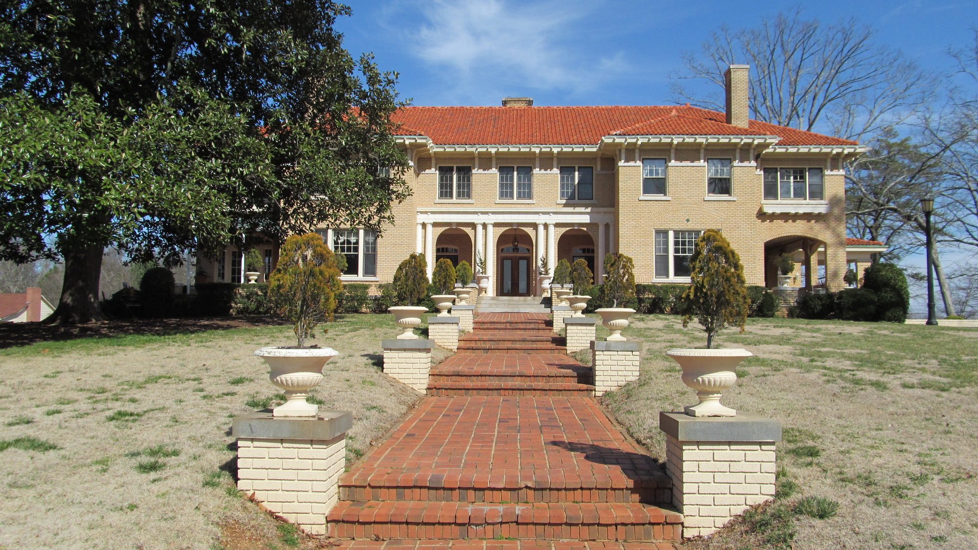 The Bona Allen Mansion in Buford, at the top of a long red-brick walk