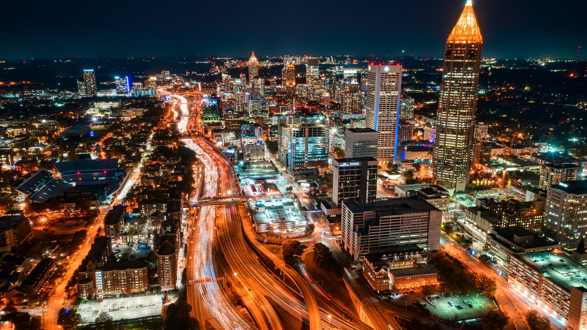 Downtown Atlanta at night, with the Downtown Connector traced in light