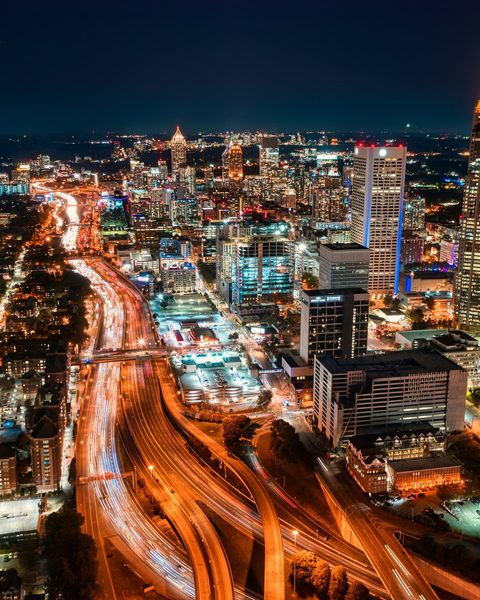 Downtown Atlanta at night, with the Downtown Connector traced in light